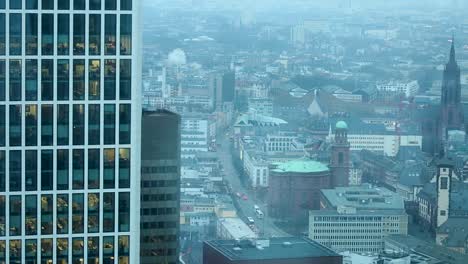 high-angle view of a dense urban landscape with skyscrapers and city streets