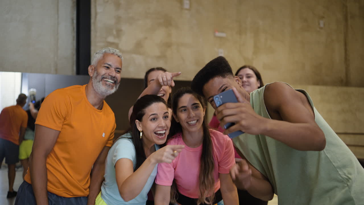 Group of friends taking a selfie and having fun together