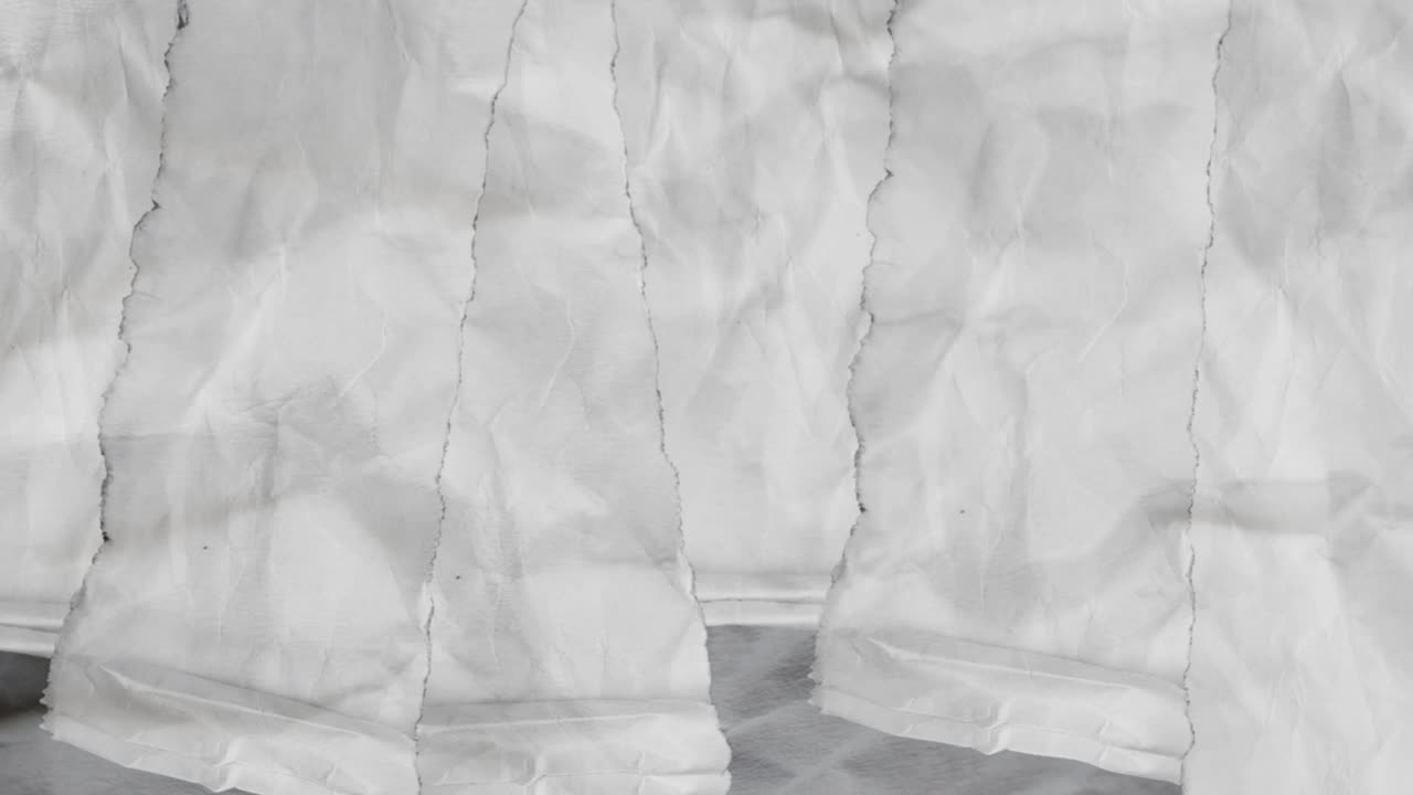 Crumpled White Paper Texture with Layered Strips
