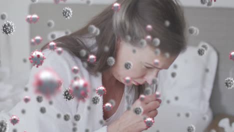 animation of virus cells over caucasian woman coughing