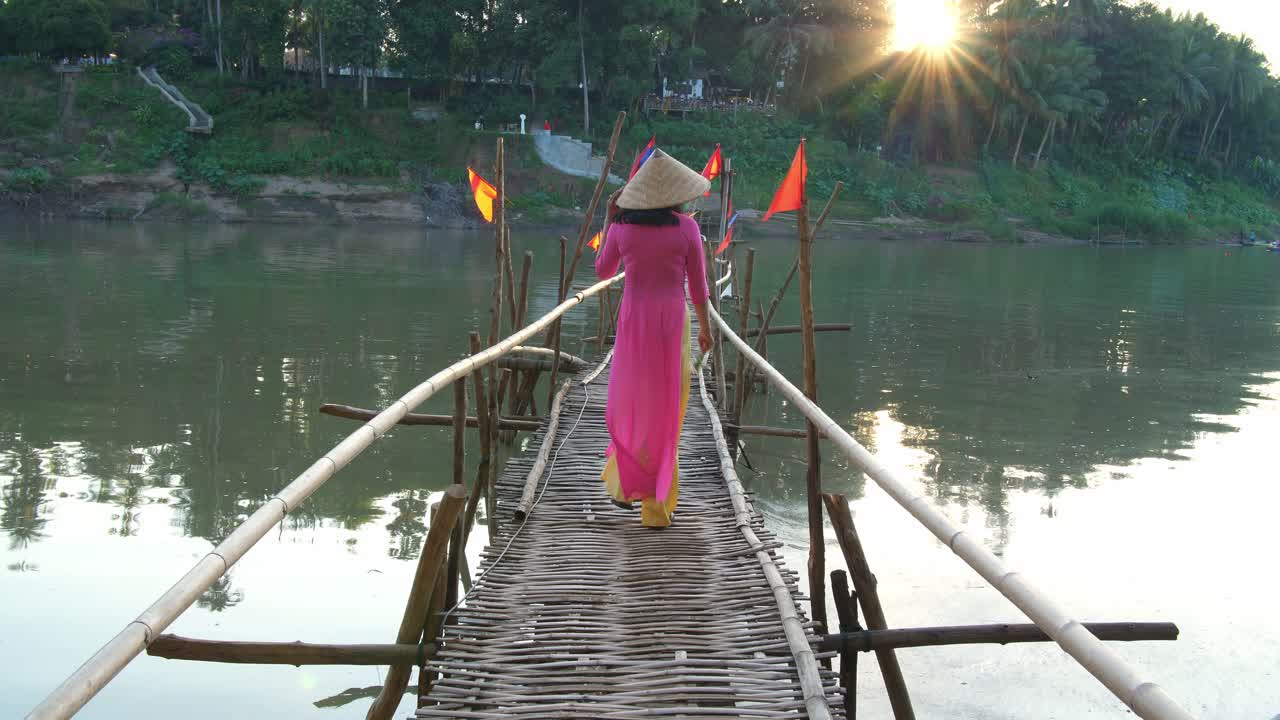 Vietnamese Girl Walking On Bamboo Bridge With Sunlight, Video In 4K