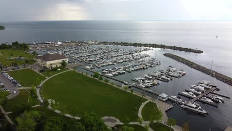 Drone-circling-over-Oakville-harbor-filled-with-boats-on-Lake-Ontario