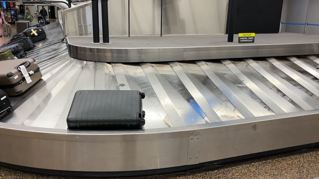 An airport baggage carousel in the arrivals hall