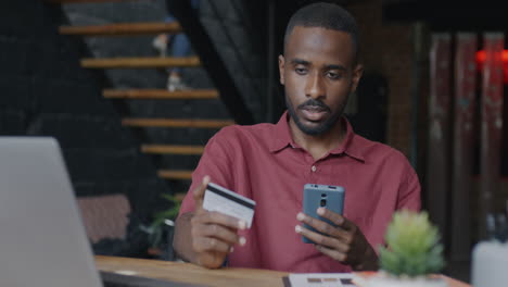 man making mobile payment