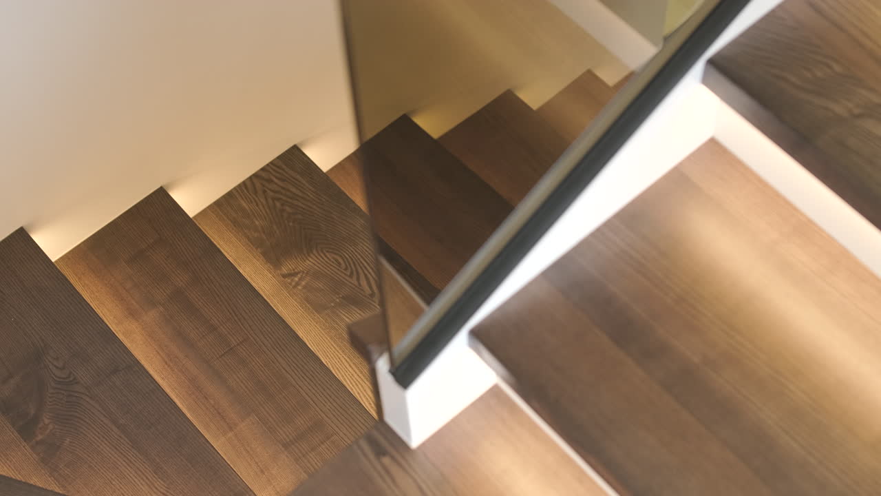High Angle View of Modern Wooden Staircase with LED Lights
