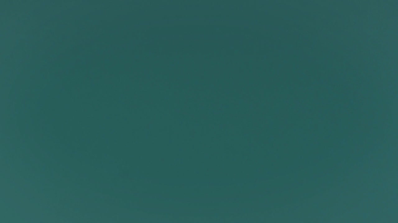 Falling Snow on Teal Background