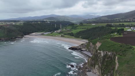 Cueva,-beach-Spain-drone,aerial--on-cloudy-day