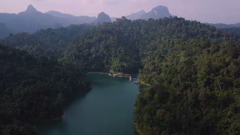 drone shot of floating raft houses in khlong phanom national park in thailand