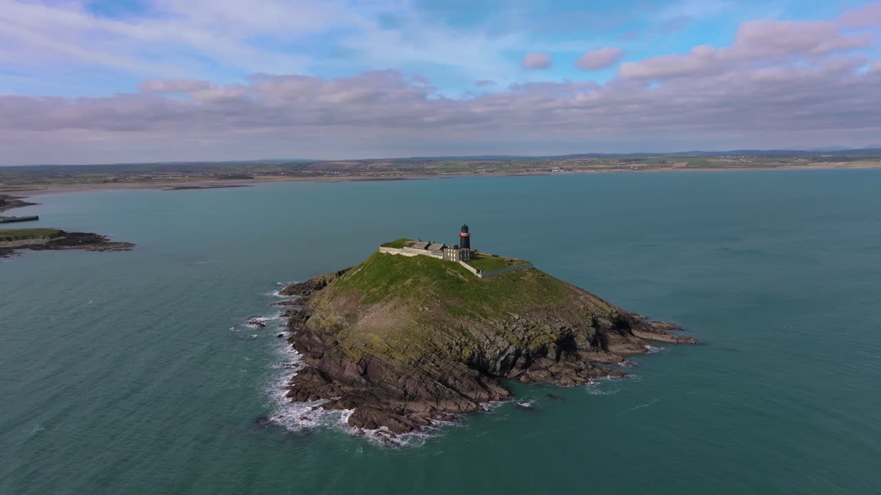 4K Cinematic Drone shot of the black Ballycotton Lighthouse overlooking the Atlantic Ocean, a symbol of Ireland’s maritime heritage Co.Cork - Ireland_12