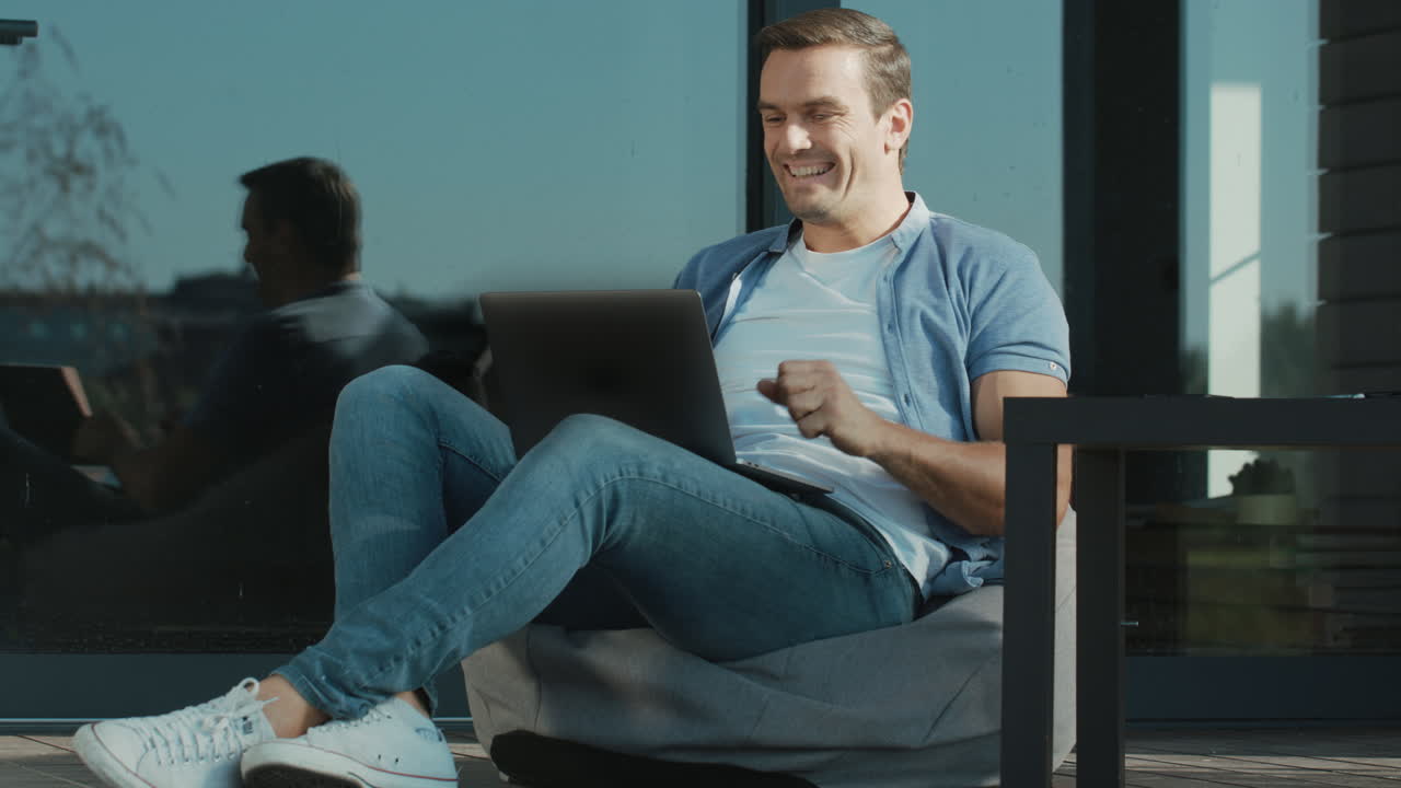 Business man achieving concept. Happy man waving hands yes