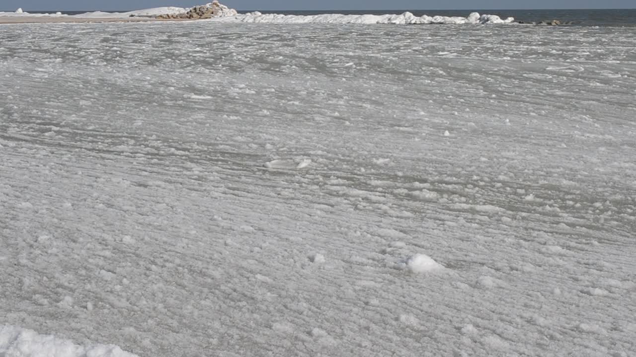Shooting in the winter. Ice and wave, sea