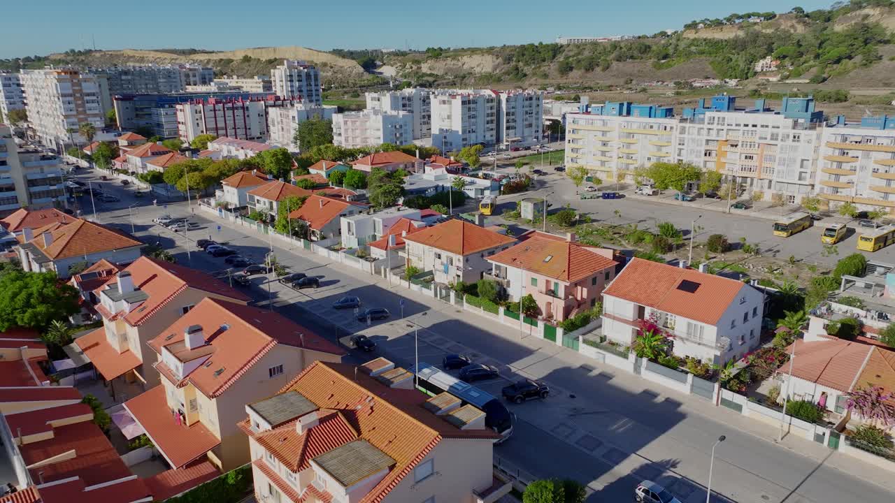 Drone shot flying over houses in Costa Da Caparica.