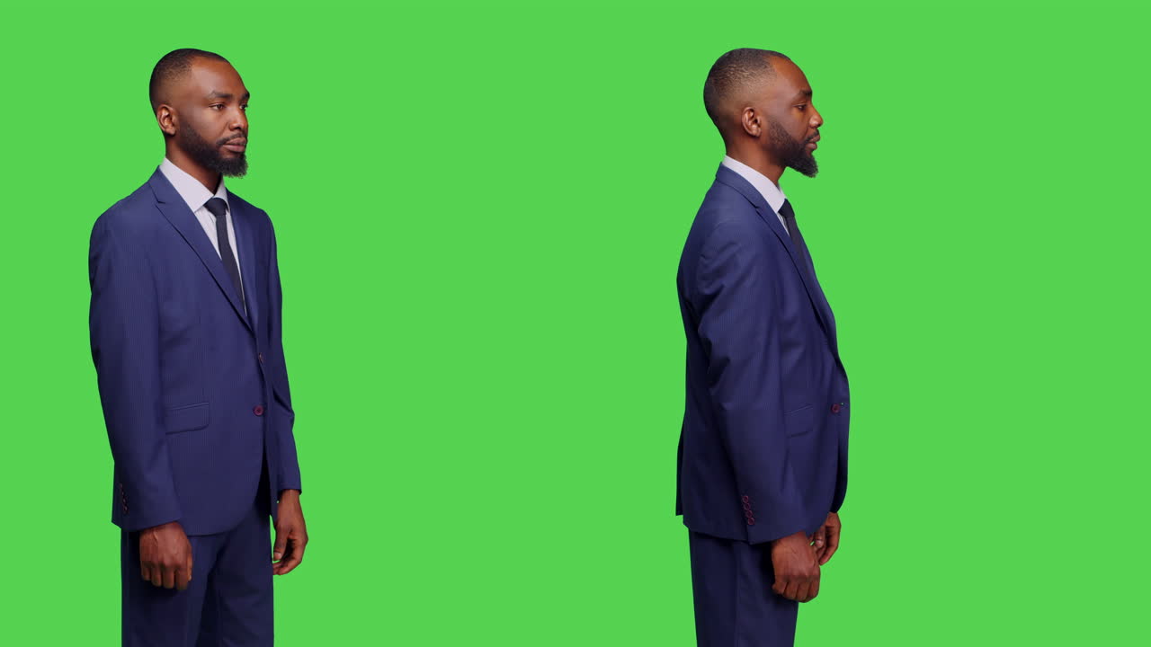African American businessman in suit on green screen