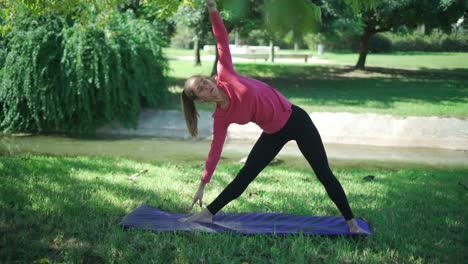 woman doing crescent lunge twist and side stretches