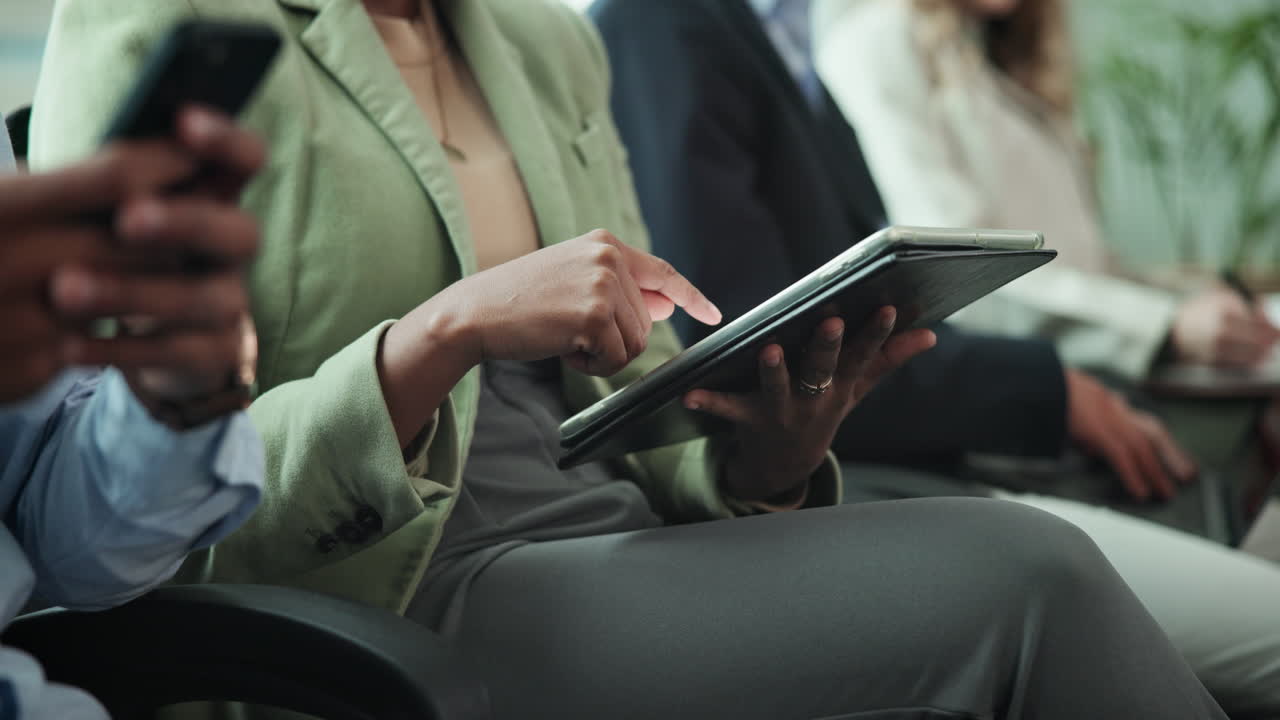 Business meeting with people using technology