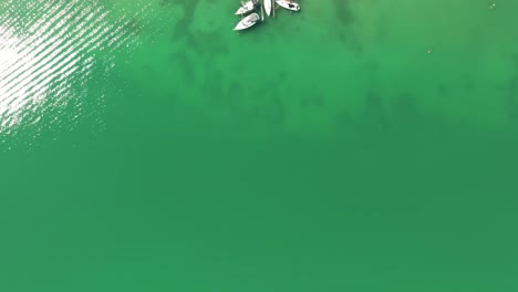 captured in stunning aerial drone footage, behold the emerald waters of wolfgangsee