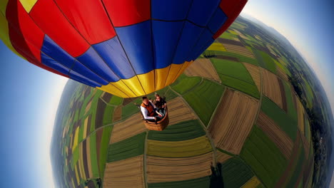 hot air balloon ride over farmland