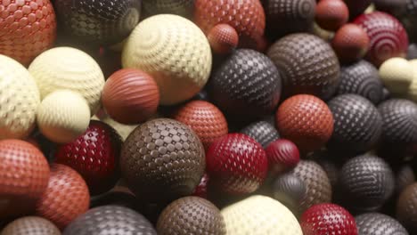 abstract 3d render of colorful patterned spheres