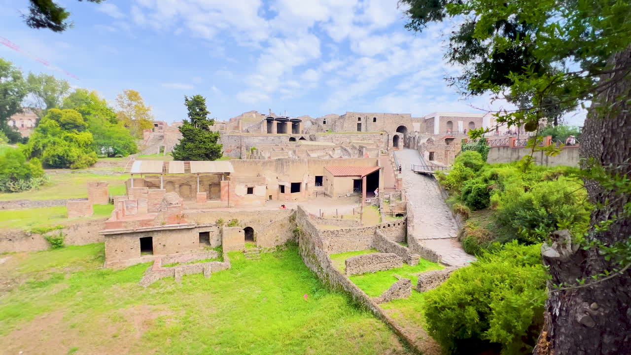 Overlooking view of Pompeii's ruins, showcasing the scale of the ancient city and the remnants of houses and streets, italy