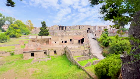 overlooking view of pompeii's ruins, showcasing the scale of the ancient city and the remnants of houses and streets, italy