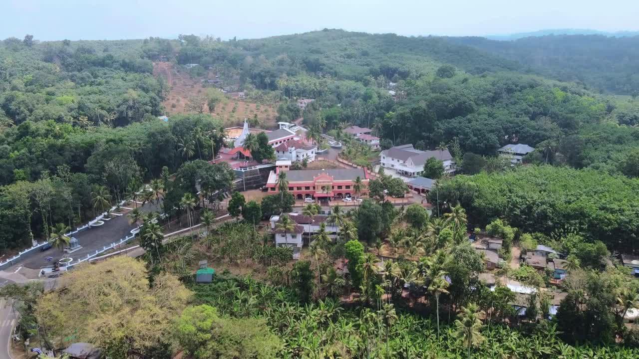 Aerial View of a Church and Village in the Hills of Kerala, India