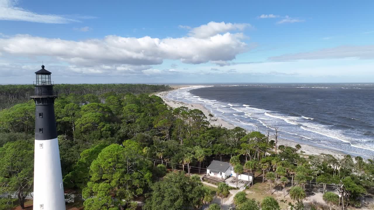 slow push past the hunting island beach lighthouse near beaufort sc, south carolina