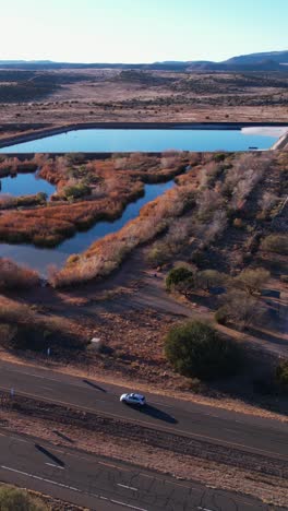 vertical aerial view of sedona wetlands sewage wastewater treatment facility and preserve by state route, arizona usa