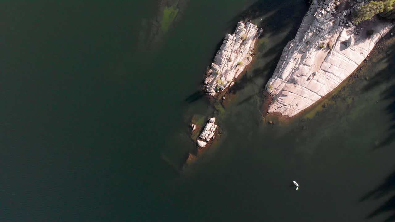 Top-down aerial shot over Lake Alpine in California.