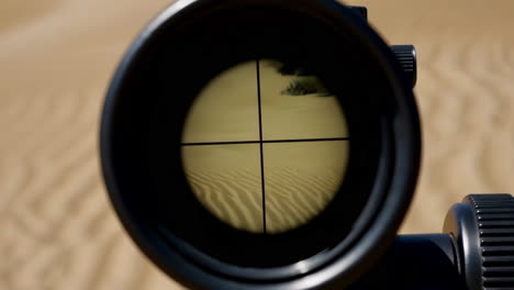sniper rifle viewpoint in desert landscape