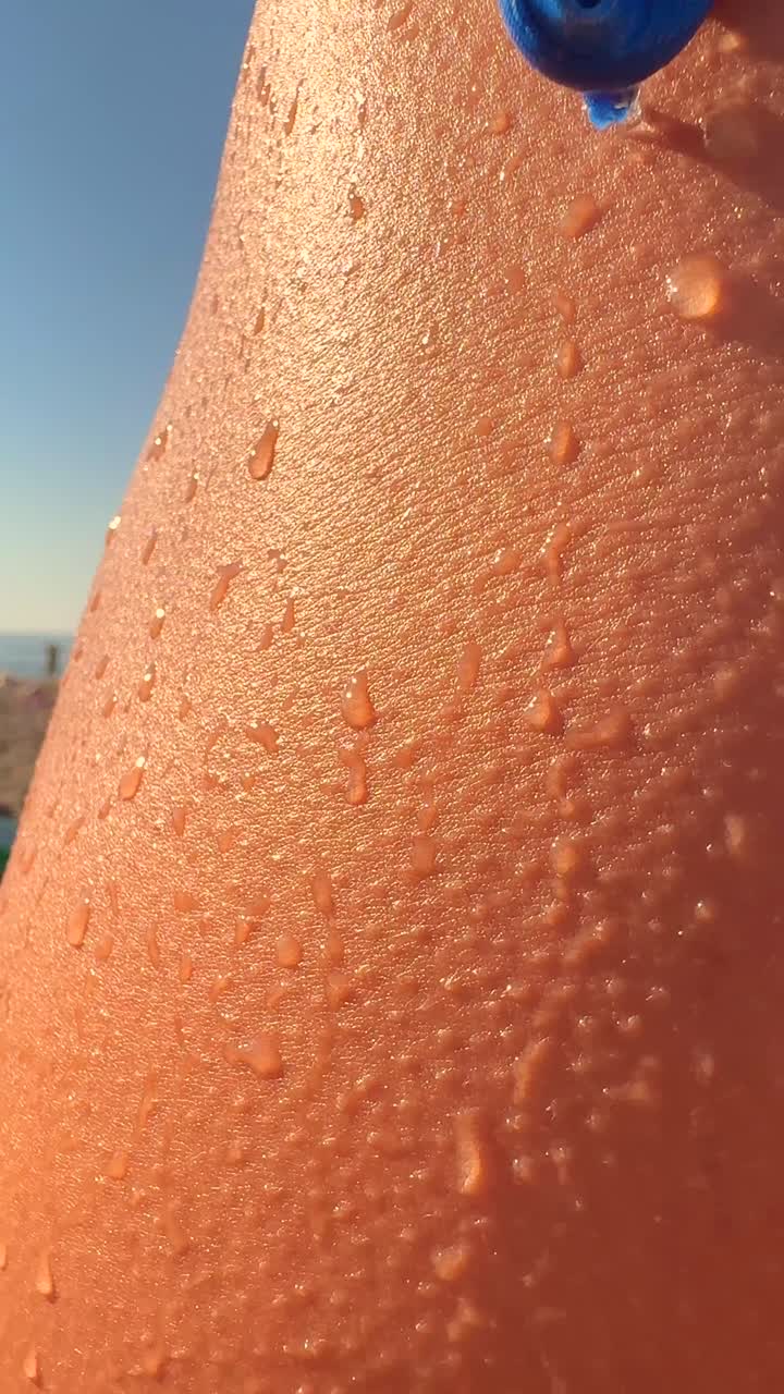 Wet skin on a beach