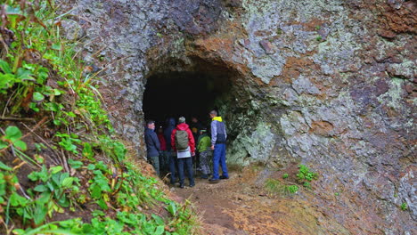 group exploring a mountain cave