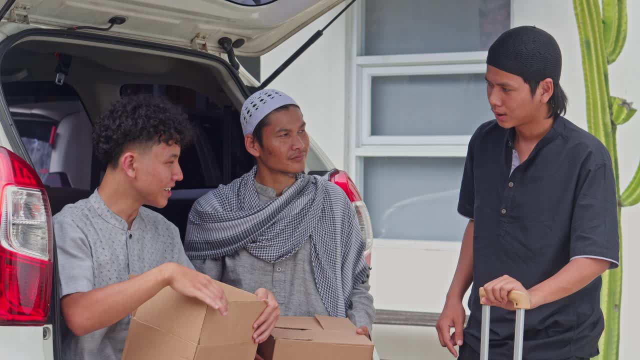 Three smiling Muslim youths checking their luggage for Eid homecoming
