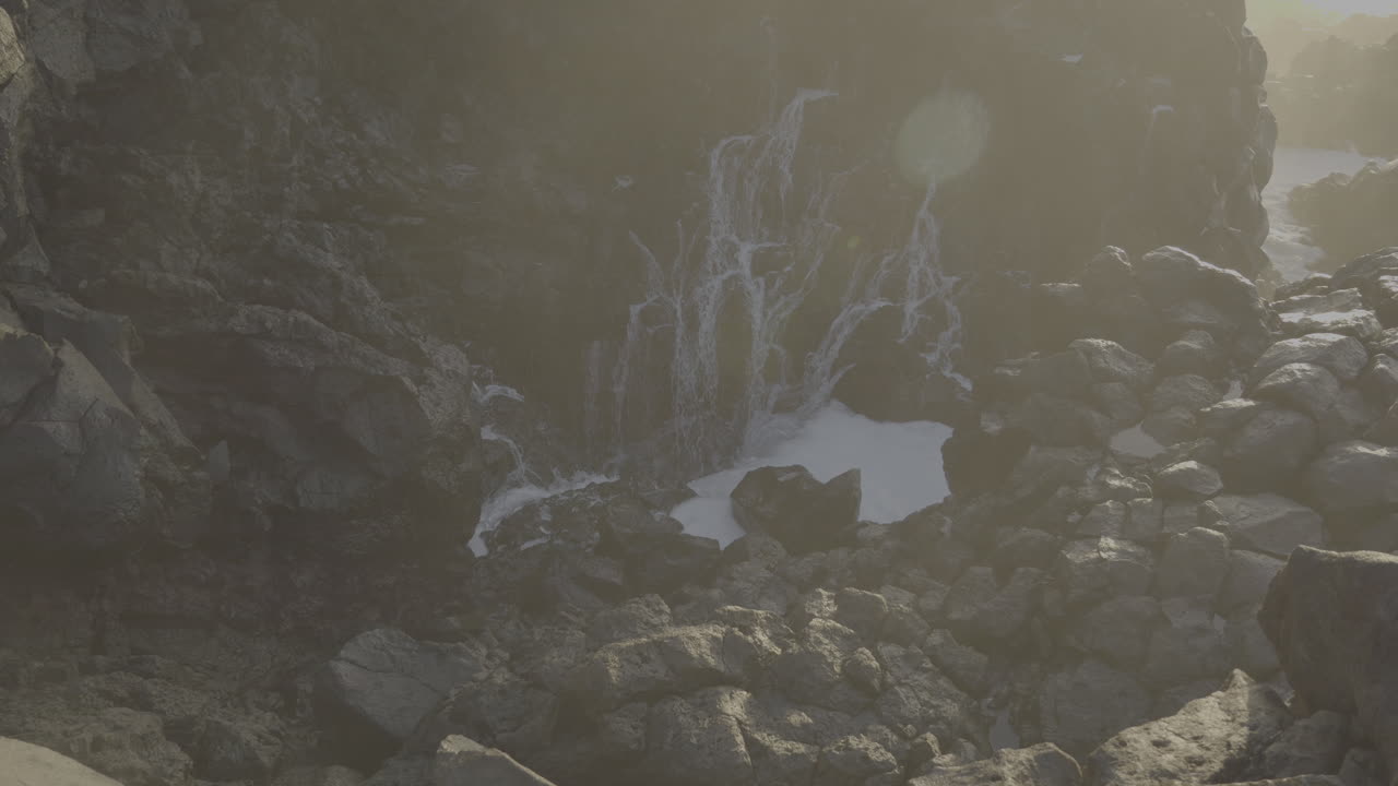 Coastal Waterfall at Sunrise