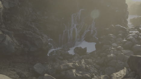 coastal waterfall at sunrise