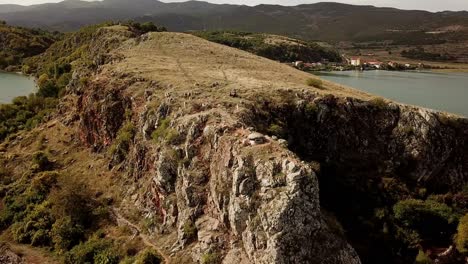 Drone-view-of-small-bunker-in-Lin,-Albania,-Europe