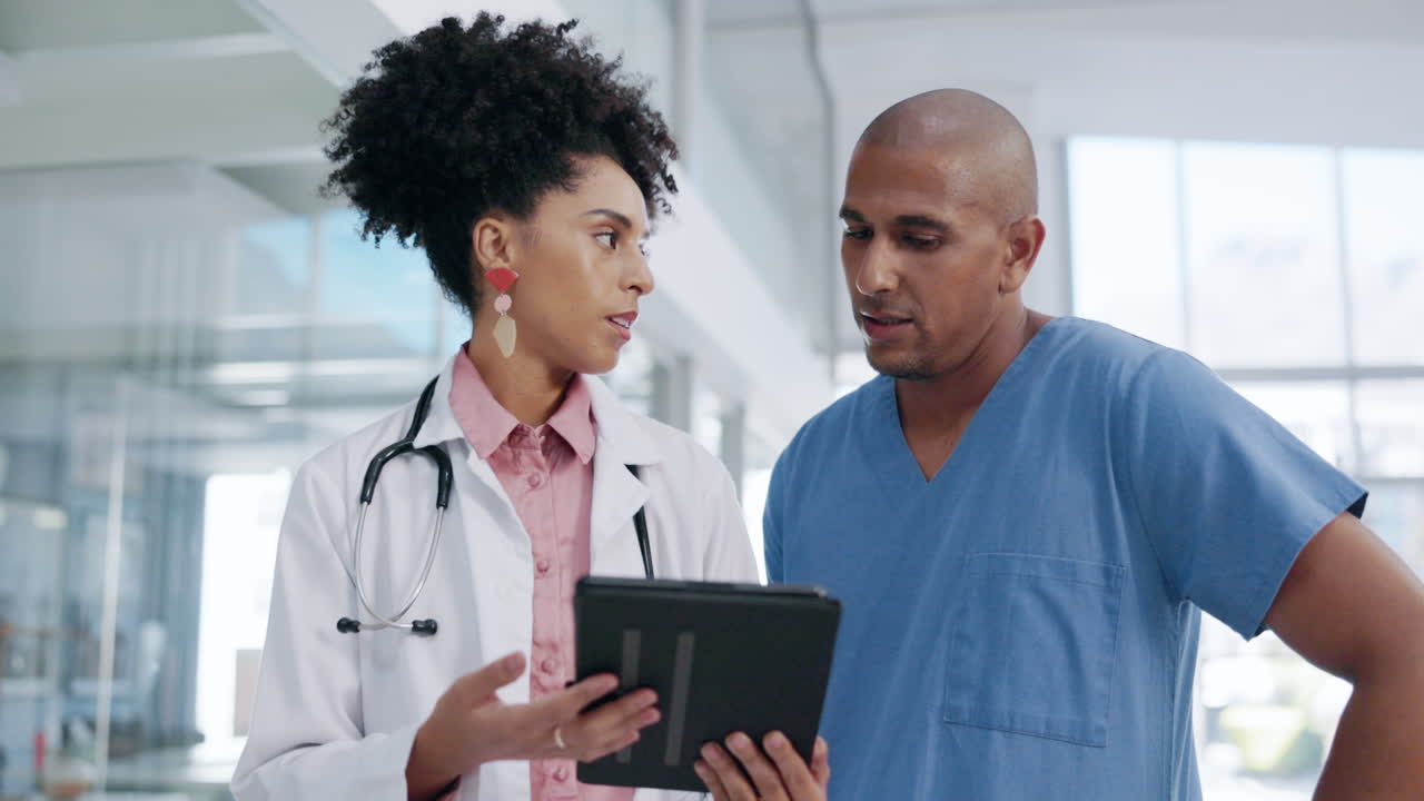 Discussion, tablet and frustrated doctors working