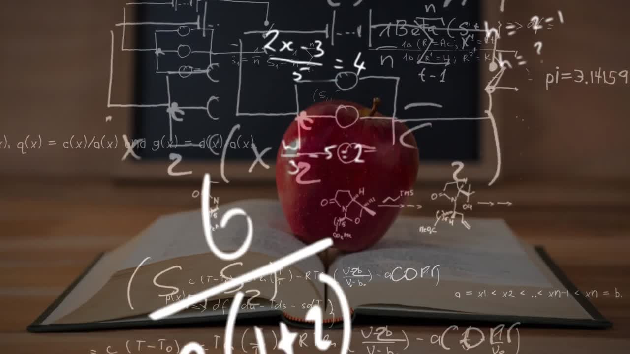 ecuaciones matemáticas contra la manzana en libro abierto