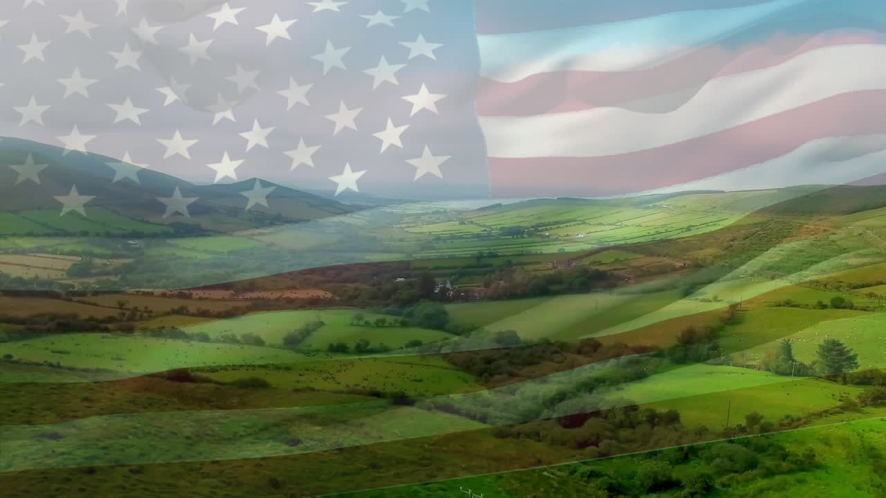 animación de la bandera de los estados unidos ondeando sobre un paisaje verde