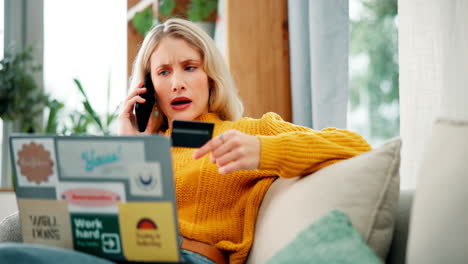 woman shopping online with laptop and credit card at home