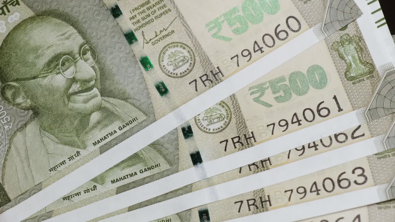 Close-Up of Indian 500 Rupee Currency Notes Featuring Mahatma Gandhi. internal shot, stable shot, 4k.