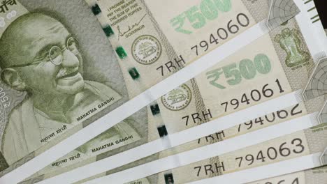 close-up of indian 500 rupee currency notes featuring mahatma gandhi. internal shot, stable shot, 4k.