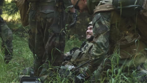 soldiers relaxing in forest