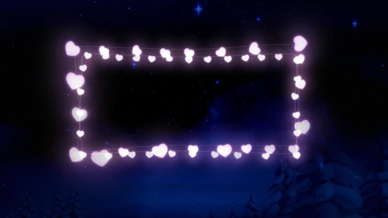 Animation of fairy light frame with copy space over fir trees and winter scenery