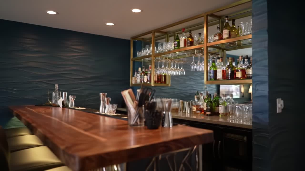 An Elegant Bar Setup Featuring an Impressive Selection of Spirits, Glassware, and Modern Decor, Showcasing a Welcoming Atmosphere for Guests
