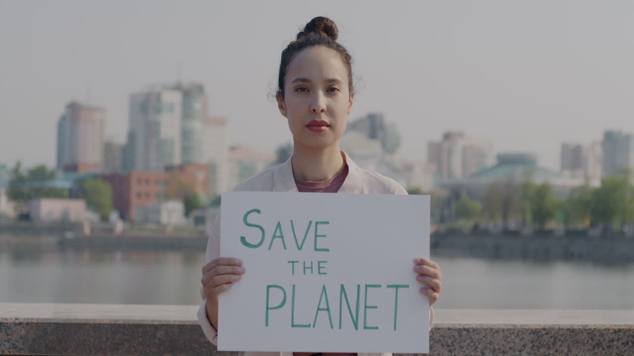 Woman Protesting for Environmental Awareness