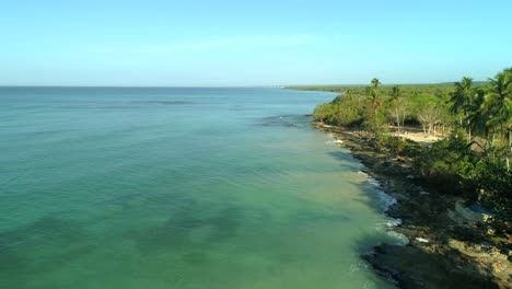 bayahibe coastline and beach in dominican republic. aerial forward
