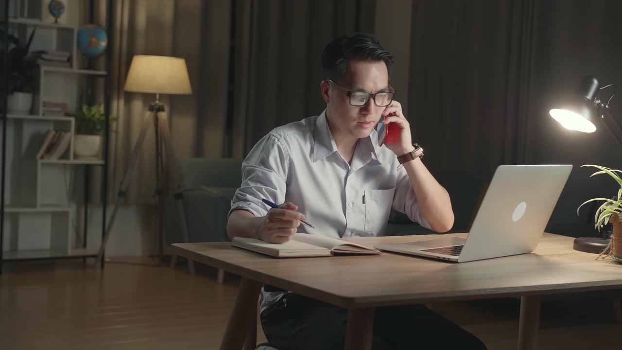 Man working late at night at home