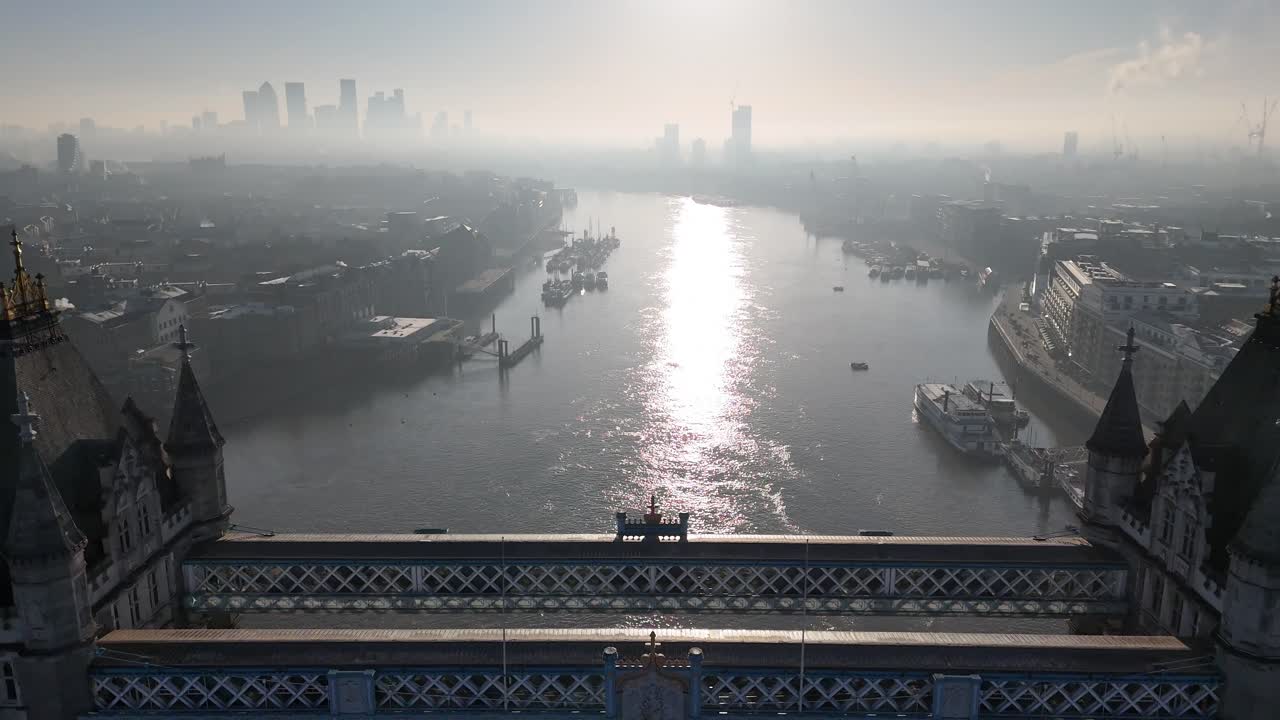 Experience stunning aerial drone footage of a Tower Bridge flyover. The River Thames, with London’s modern Docklands skyline in the background. Perfect for cinematic, travel, and documentary projects.