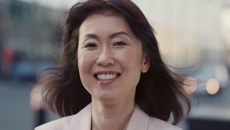 slow motion portrait of beautiful japanese woman smiling