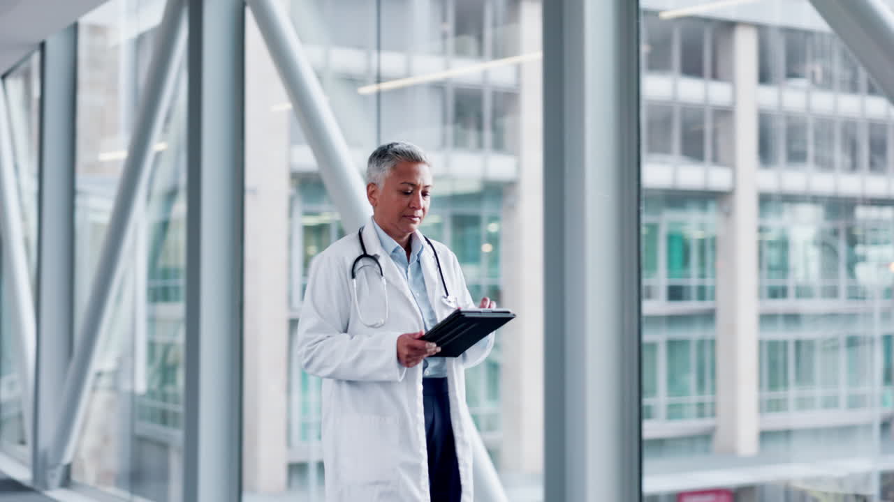 Doctor, tablet and a woman walking in a hospital